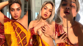 Beautiful Colored Hair Babe Showing Boobs